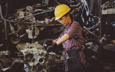 Auditor inspecting a Chinese manufacturing facility during an ISO 9001 factory audit