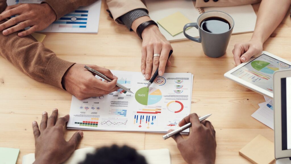 Business professionals in a negotiation meeting discussing supplier terms