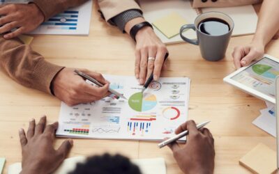 Business professionals in a negotiation meeting discussing supplier terms