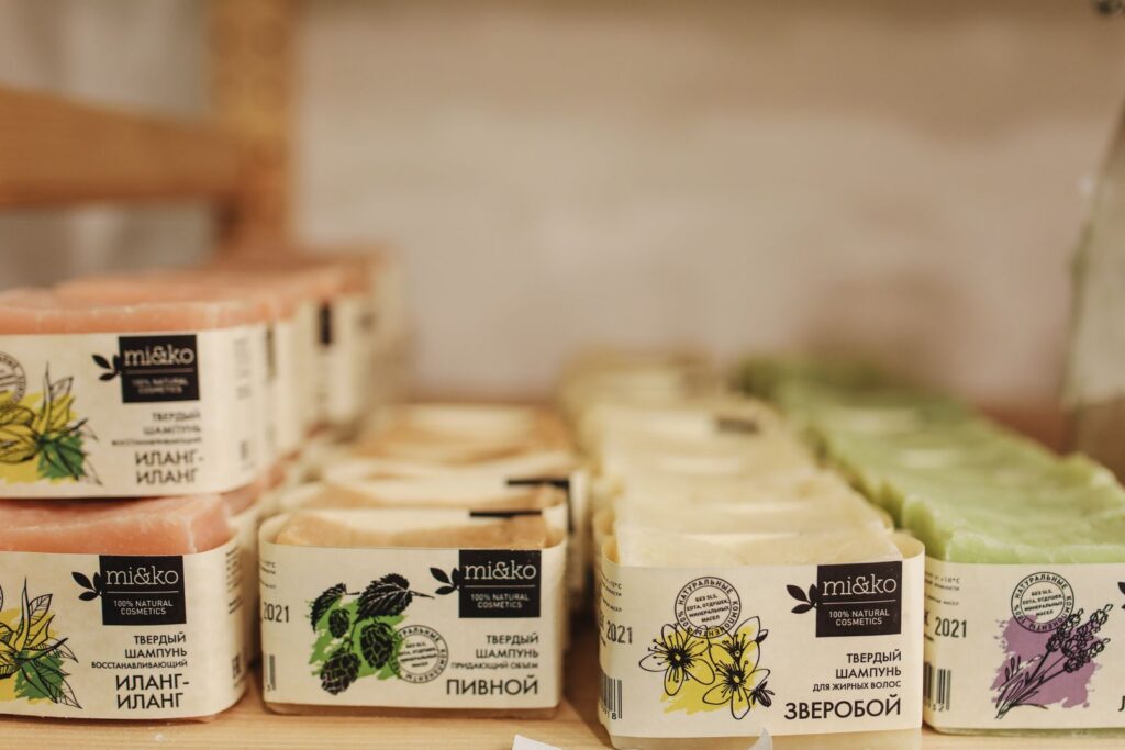 Skincare products arranged on a shelf with custom branded labels