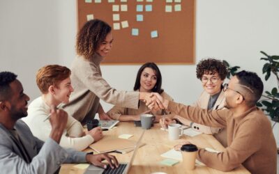 Business professionals discussing procurement strategy in a modern conference room