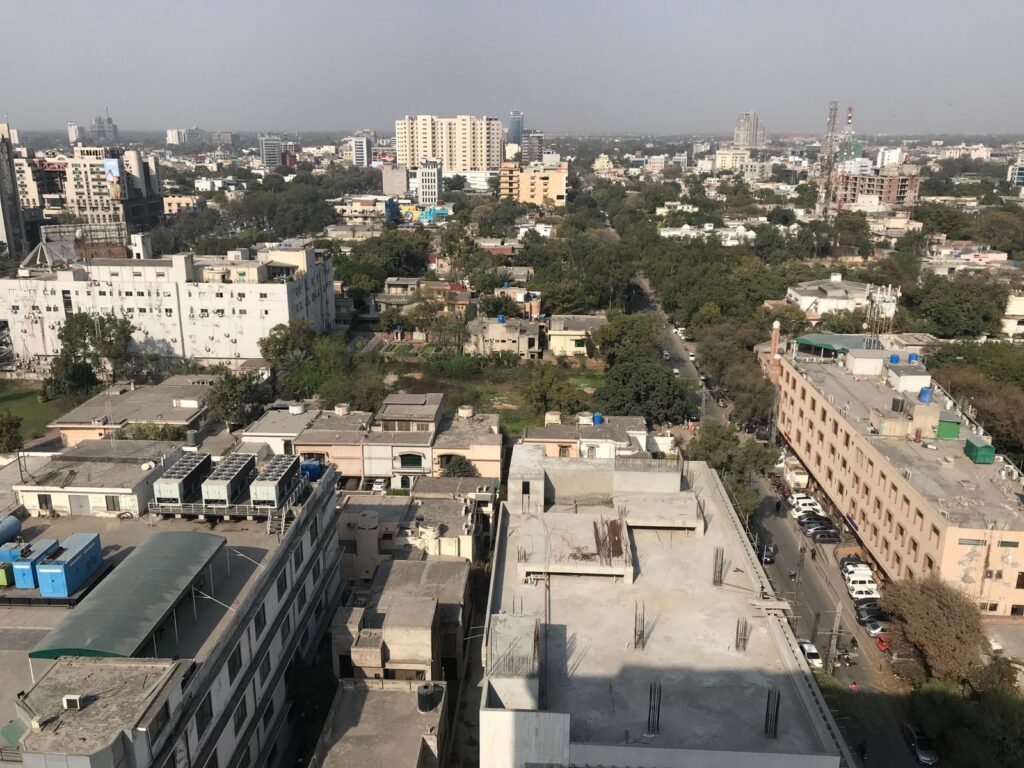 Logistics workers managing inventory inside a large warehouse fulfillment center
